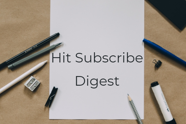 Pens and paper on a busy desk